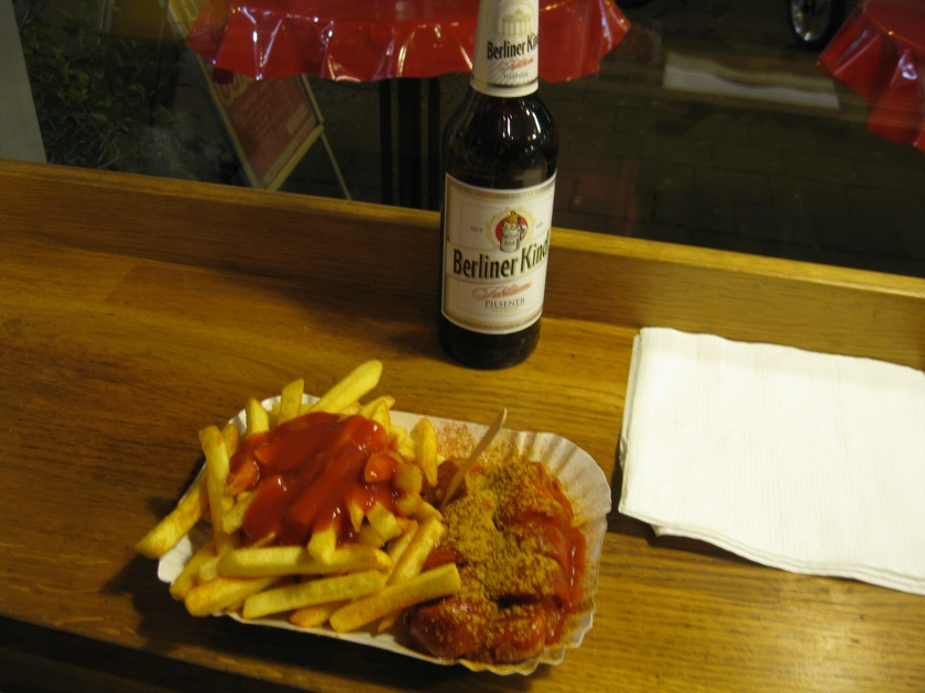 For the equivalent of $5 U.S., you get currywurst, fries and a beer.